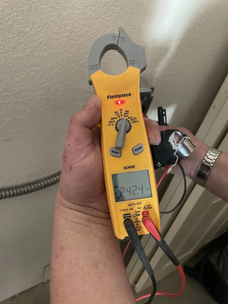 Voltage testing with clamp meter during Electrical Installation Services in Cherry Hill